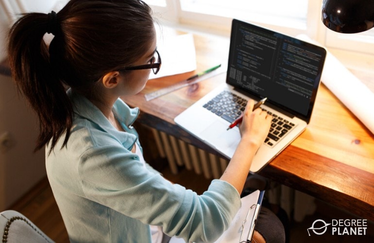computer programmer working on her laptop