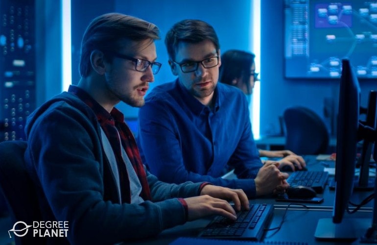 Cybersecurity investigators working in a government facility
