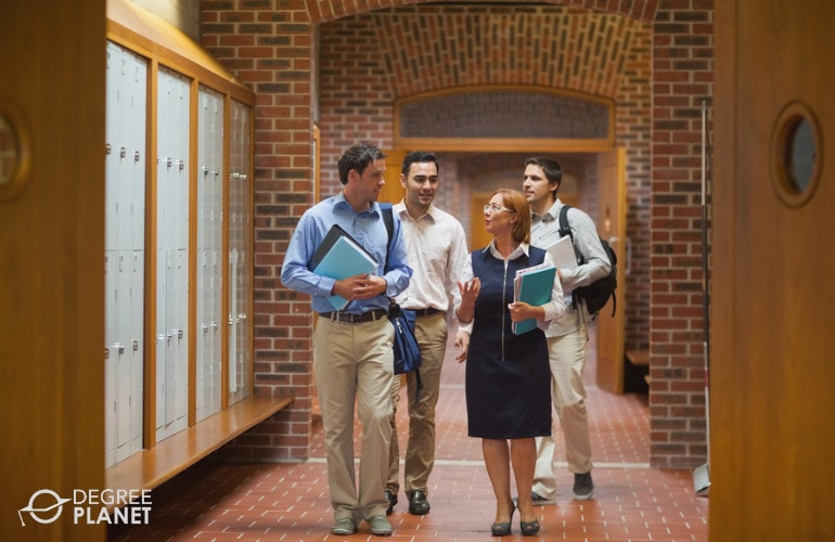 college students walking in hallway