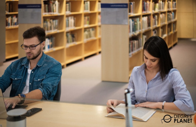 Bachelor's Degree in Education students studying in library