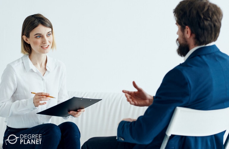 Organizational Psychologist interviewing an employee