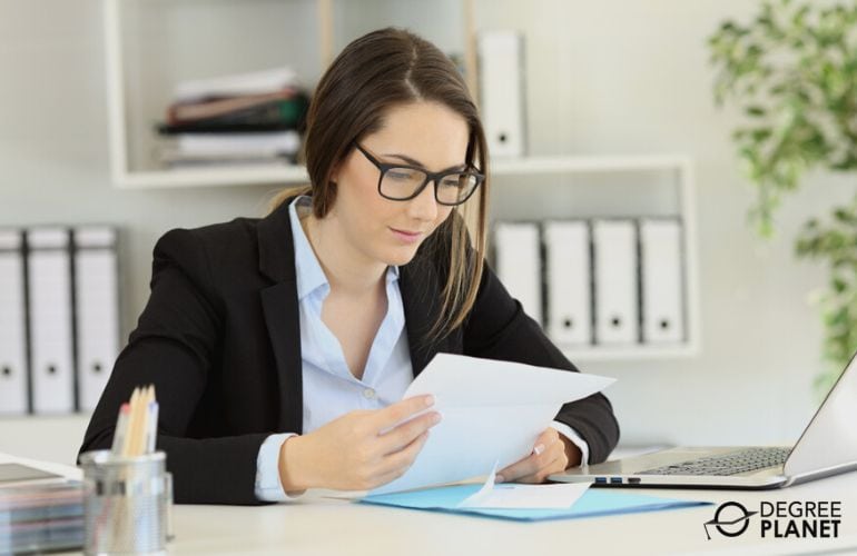 Woman preparing requirements for BS in HIM