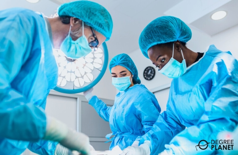 Medical Assistant assisting doctors during surgery