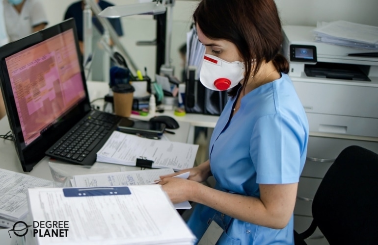 Medical Records Specialist working in her office