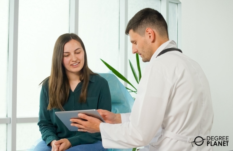 Medical Claims Examiner discussing terms with a patient
