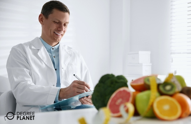Nutritionist reviewing some client's record