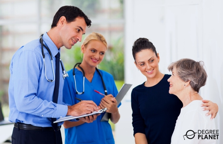 Family Nurse Practitioner & doctor, discussing with a patient