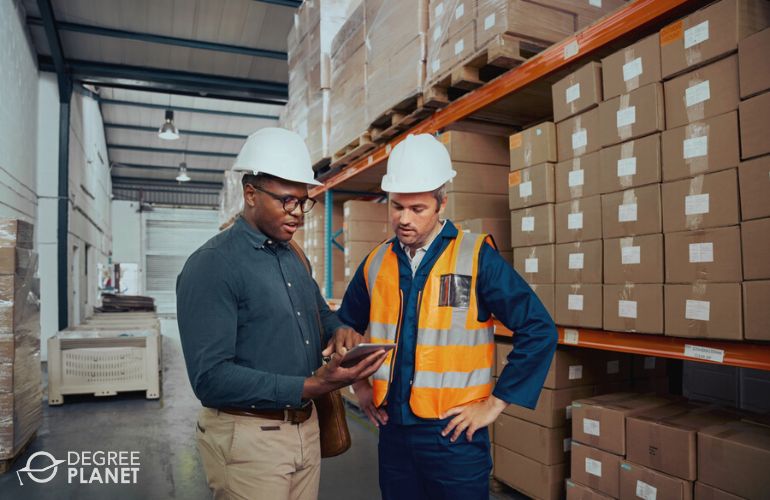 Compliance Manager discussing with warehouse operations manager