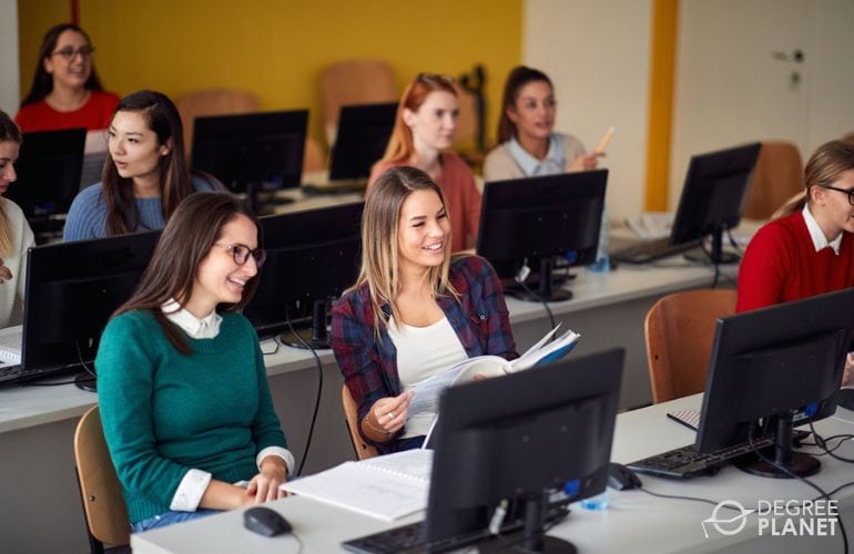students taking computer-based GED exam